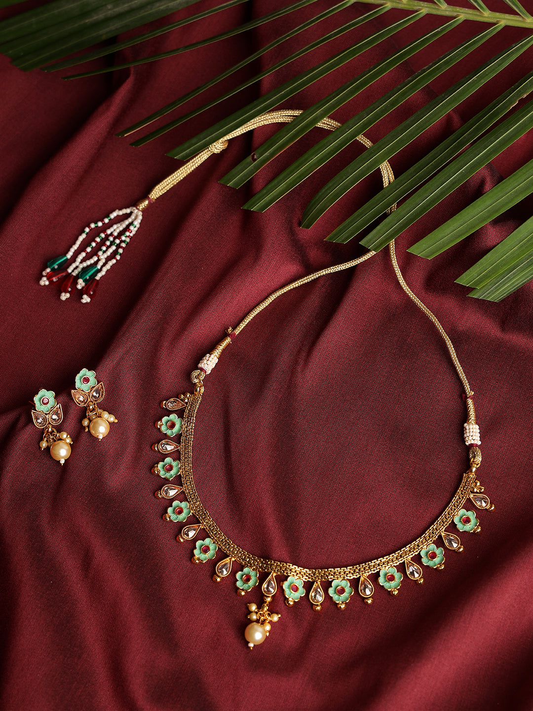 Gold Plated & White Stone Studded Green Enameled Handcrafted Jewellery Set - Jazzandsizzle