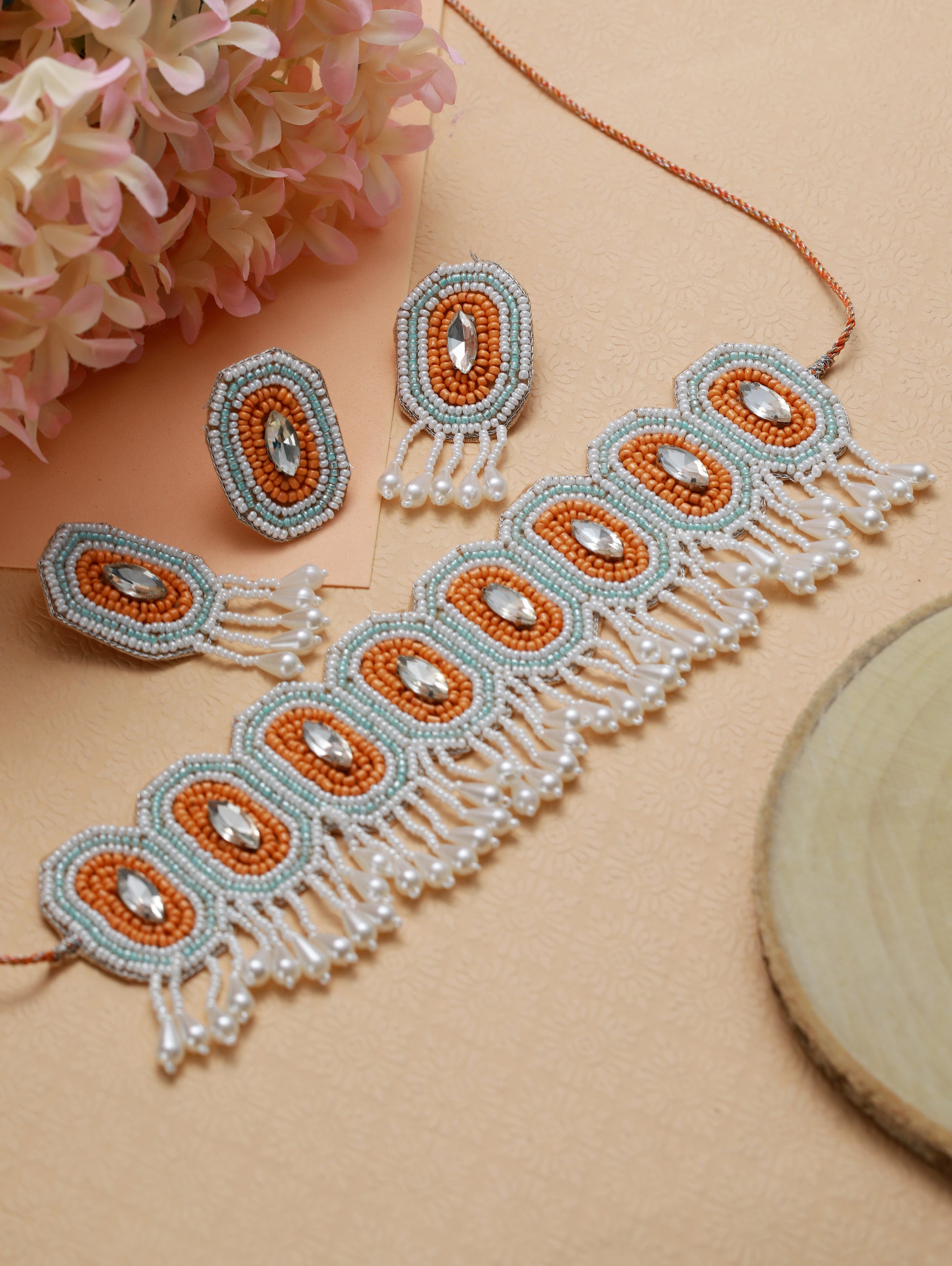 White Crystal Studded Gold-Plated Orange Beaded & Handcrafted Jewellery Set with Ring - Jazzandsizzle