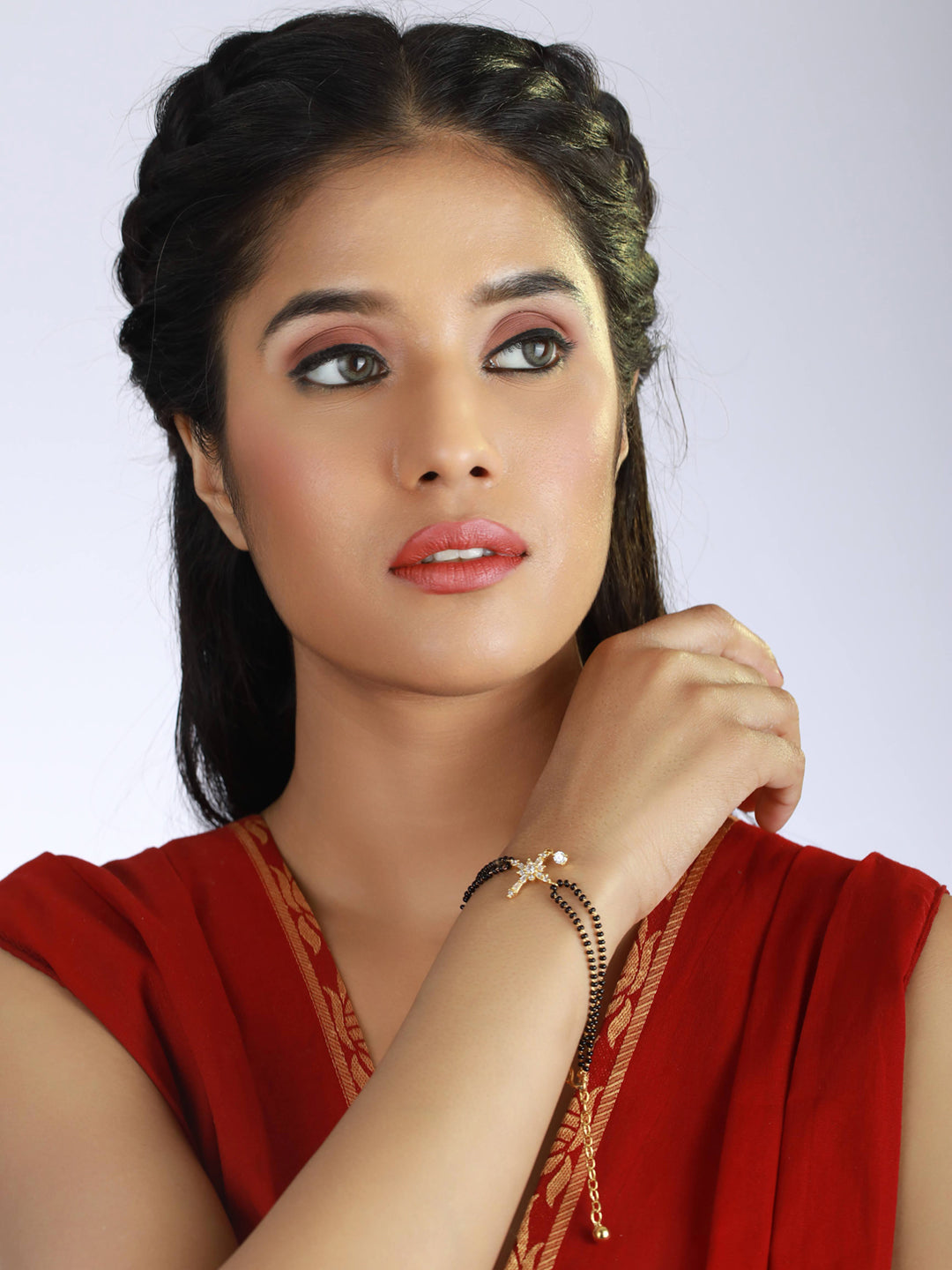 Women Gold-Plated & Black Stone Beaded American Diamond Hand Mangalsutra - Jazzandsizzle