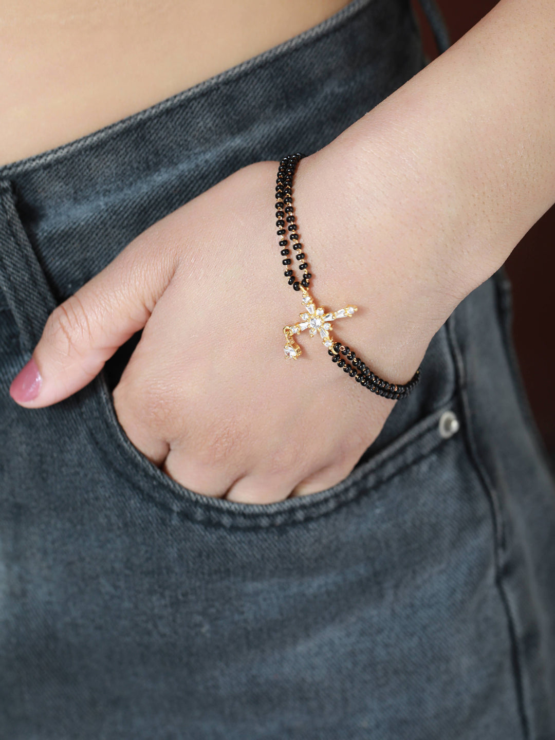 Women Gold-Plated & Black Stone Beaded American Diamond Hand Mangalsutra - Jazzandsizzle